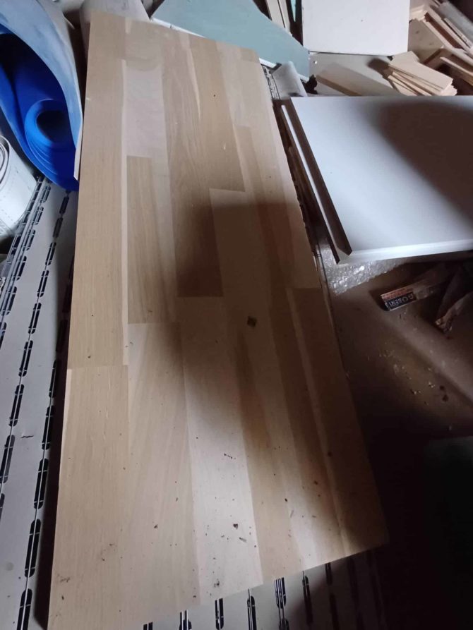 Solid laminated oak wood panel made from oak slats.